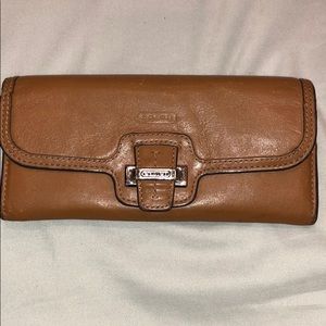 Coach-brown leather wallet.